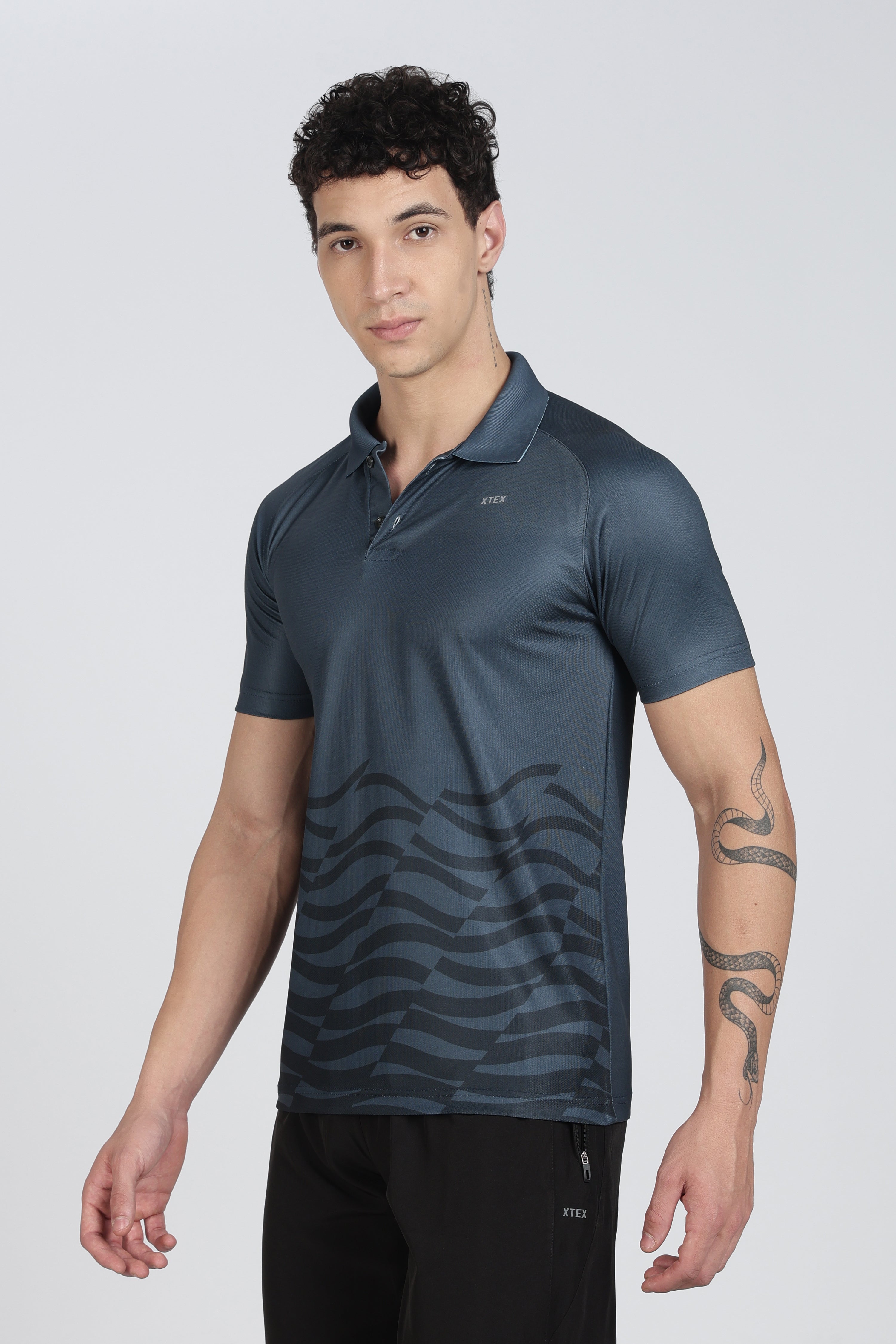 XTEX Blue Performance Polo – Wavy Stripe Athleisure Shirt for Cricket & Active Wear