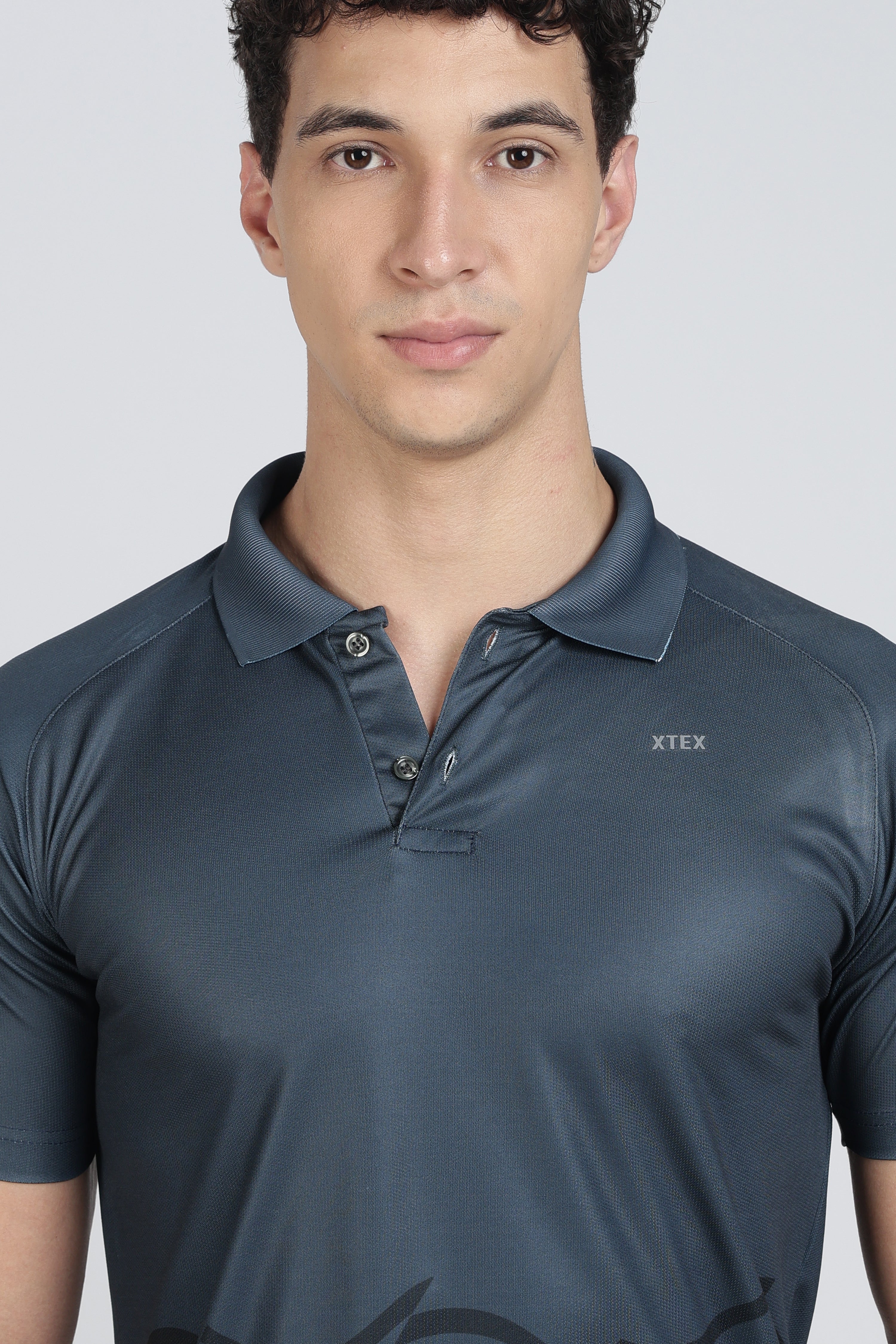 XTEX Blue Performance Polo – Wavy Stripe Athleisure Shirt for Cricket & Active Wear