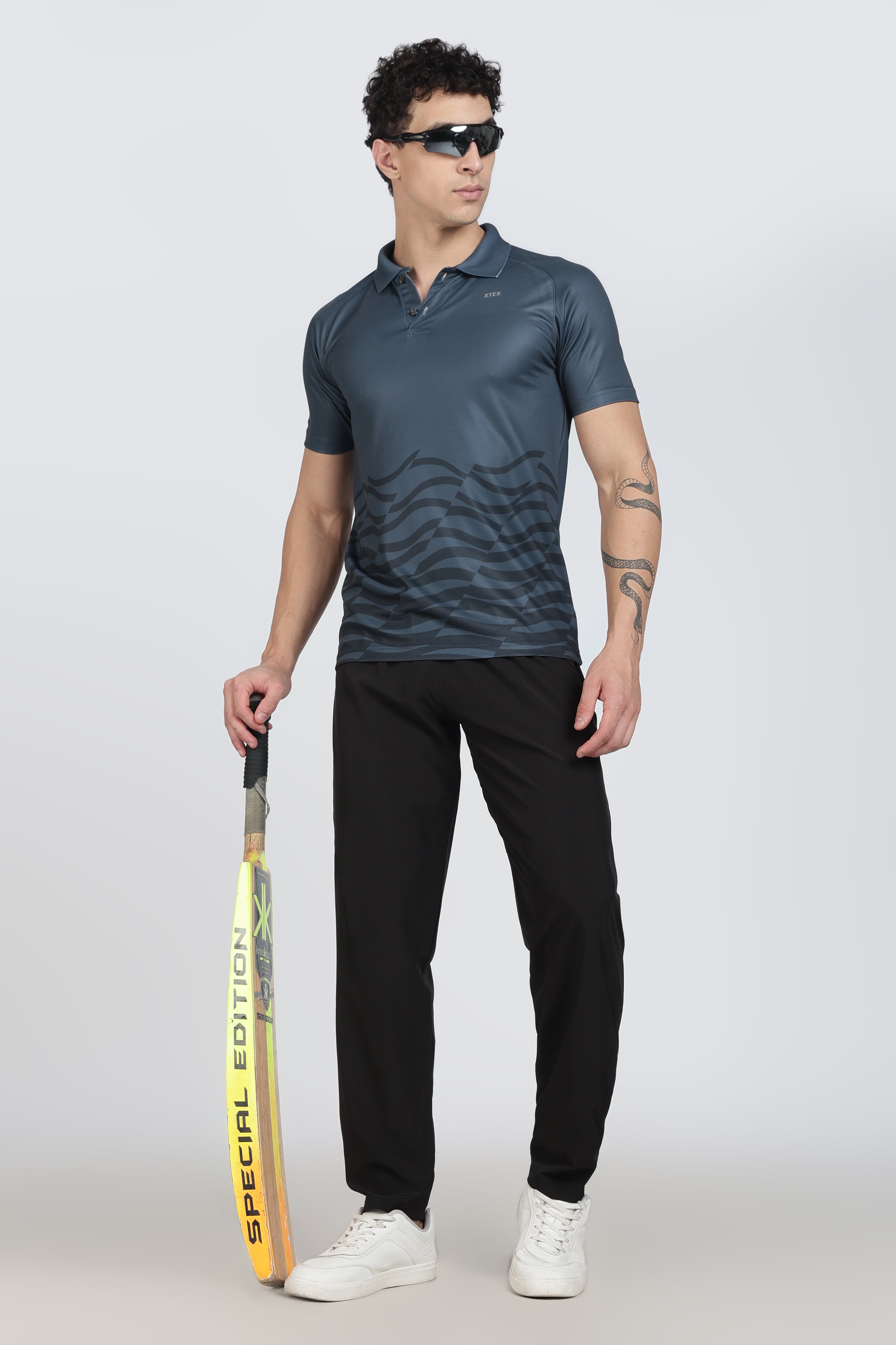 XTEX Blue Performance Polo – Wavy Stripe Athleisure Shirt for Cricket & Active Wear