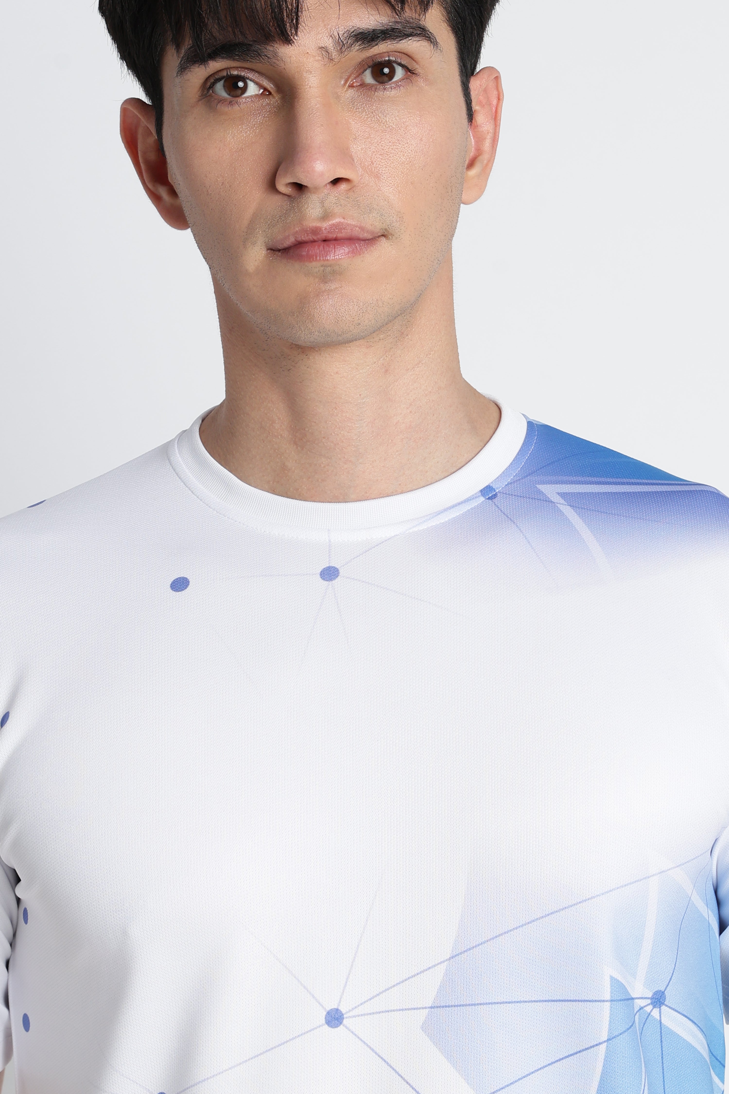 White Jersey Tee with Blue Geometric Design – Breathable Athleisure Shirt