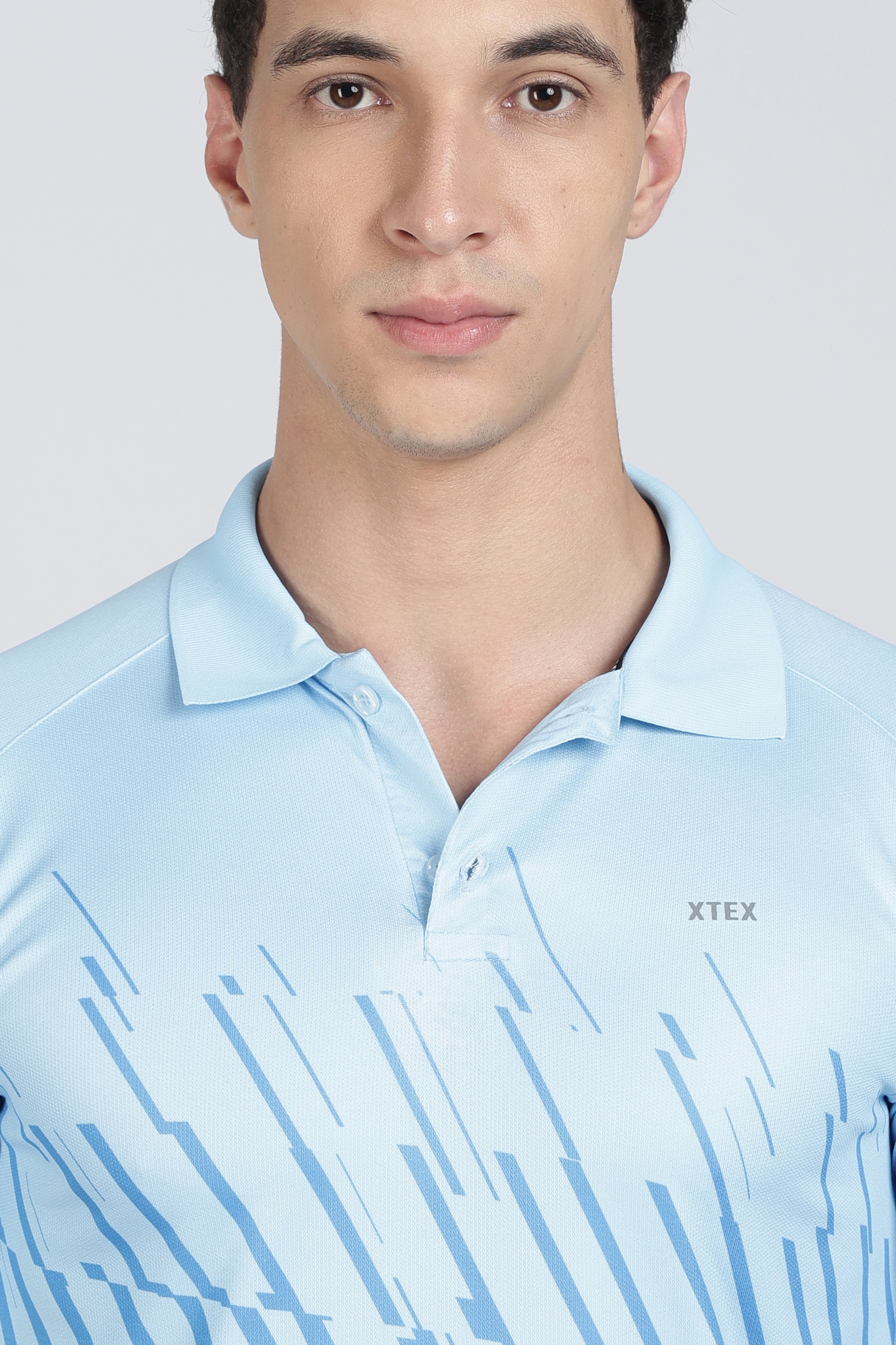 Light Blue Polo – Breathable Diagonal Stripe Activewear for Cricket & Casual