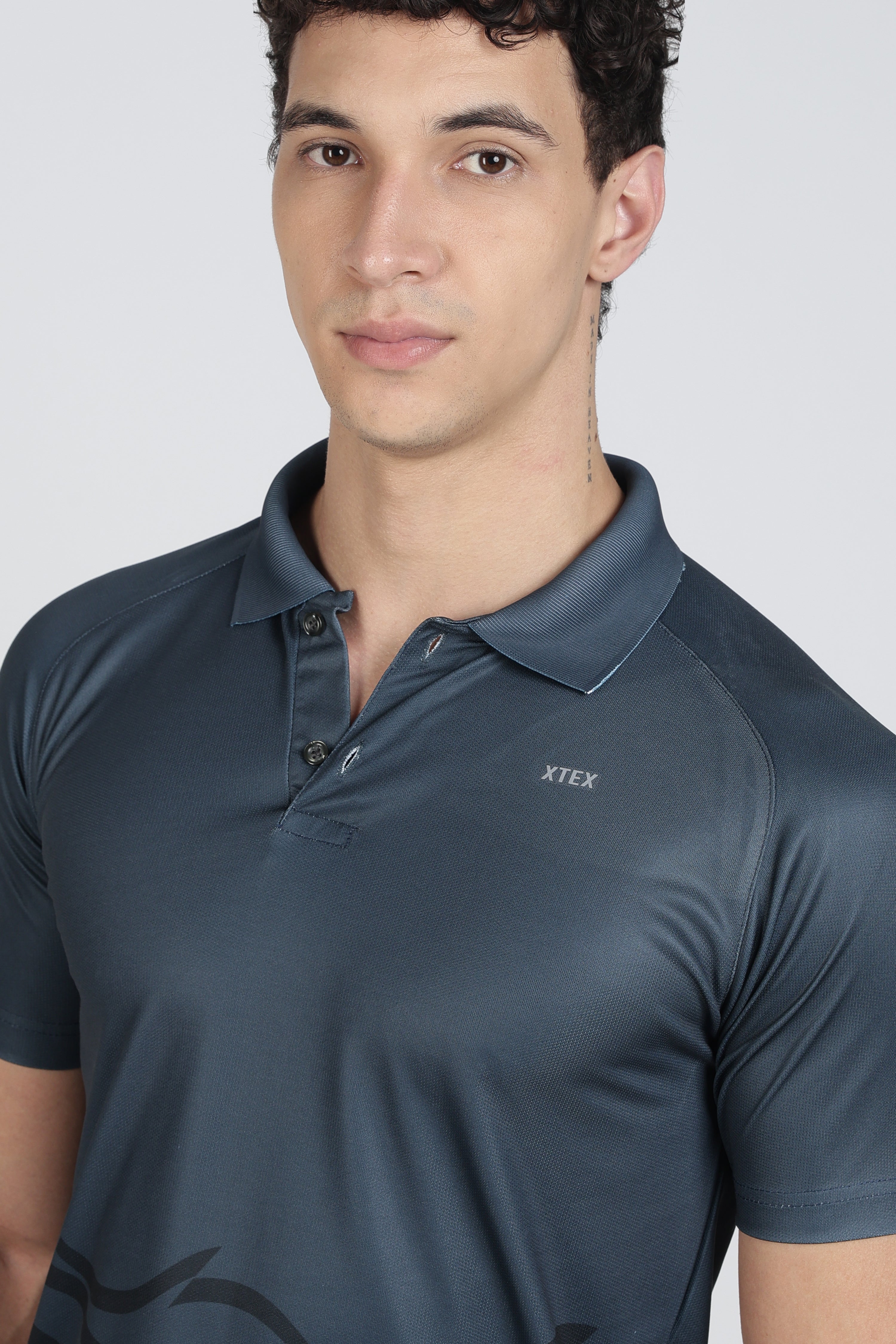 XTEX Blue Performance Polo – Wavy Stripe Athleisure Shirt for Cricket & Active Wear